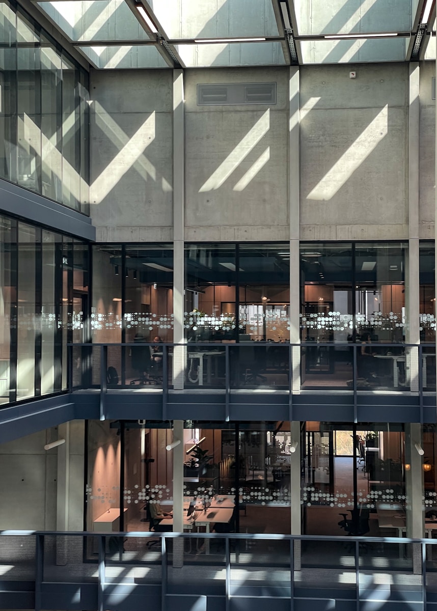 A large building with lots of windows and a skylight